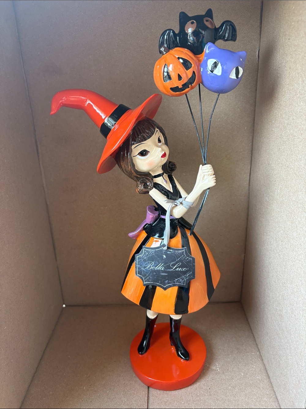 Bella Luxx Orange and Black Witch Figurine with Halloween Balloons